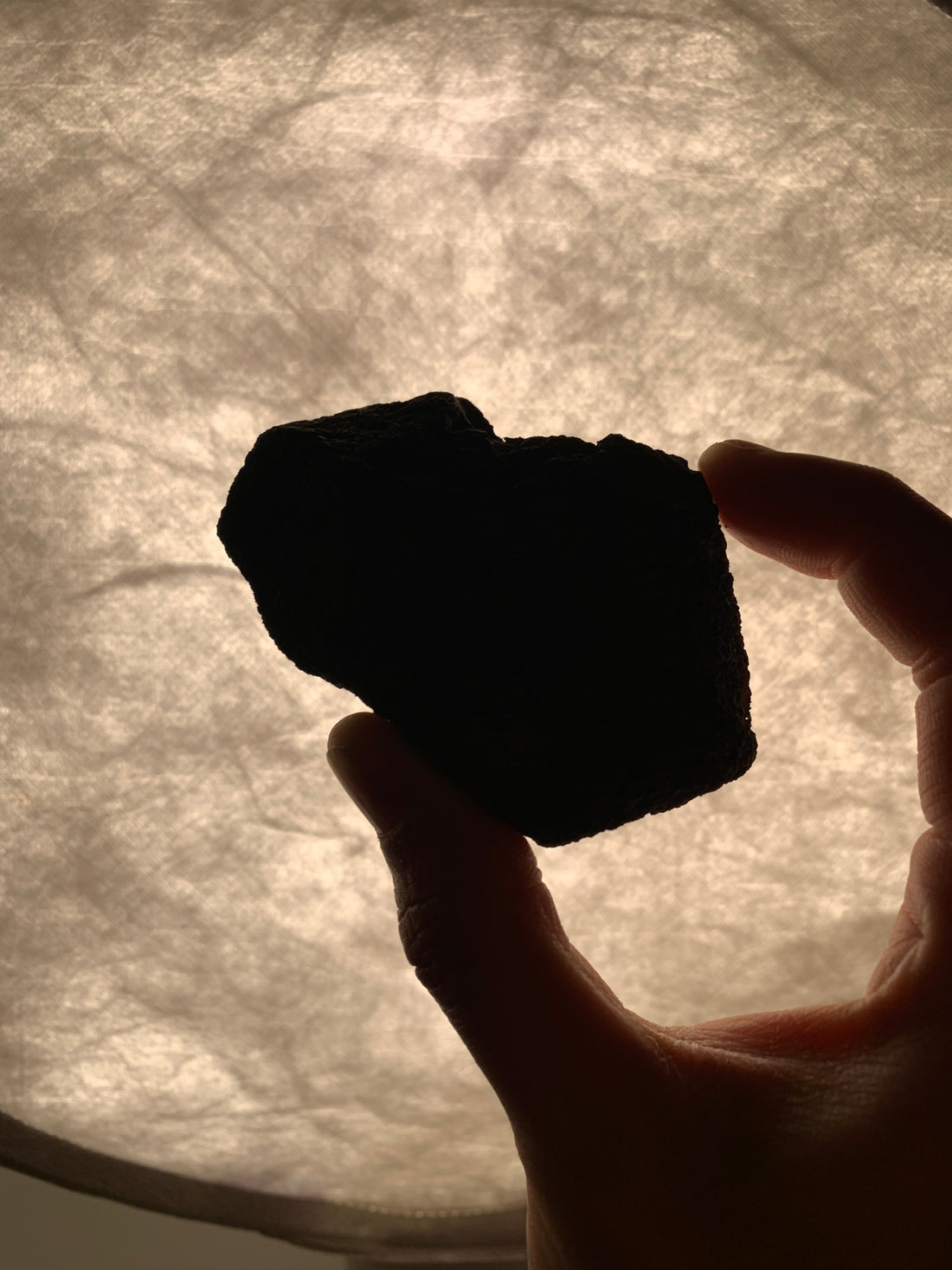holding Lava Stone with backlight